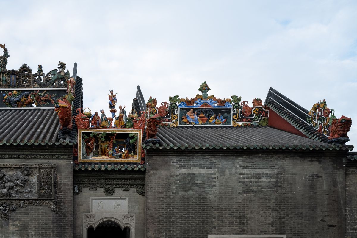 Elaborate ceramic rooftop decoration at Chen Clan Academy in Guangzhou