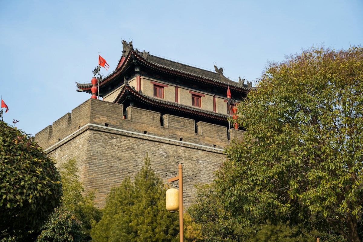 A tower on Xi’an’s city wall. Choose a named, currently open entrance before booking transport.